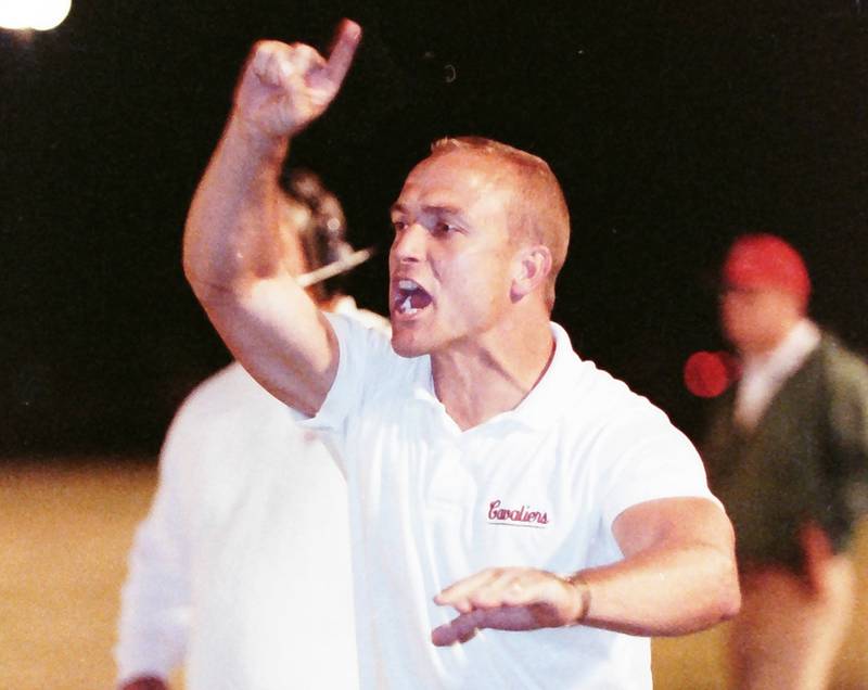 La Salle-Peru assistant coach Bill Booker yells out instructions against Ottawa on Friday, Sept. 23, 1992 at King Field in Ottawa.