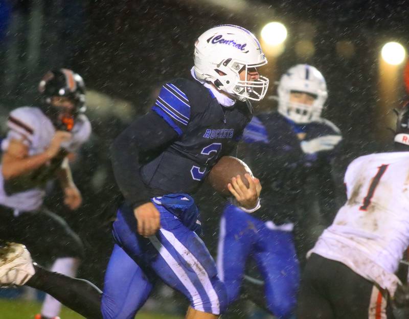 Burlington Central’s Landon Arnold moves the ball against Harlem in IHSA football Class 6A second-round playoff action at Central High School in Burlington on Saturday, November 8, 2025.