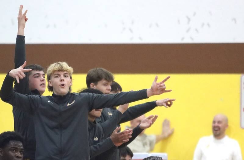 Jacobs’ Golden Eagles celebrate a three-pointer against Barrington during Hinkle Holiday Classic varsity boys basketball tournament action on Monday, Dec. 23, 2024 at Jacobs High School in Algonquin.