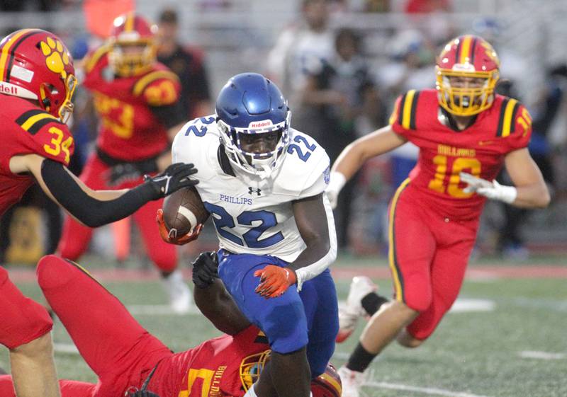 Phillips’ Ameen Robinson carries the ball during the season-opener in Batavia on Friday, Aug. 25, 2023.