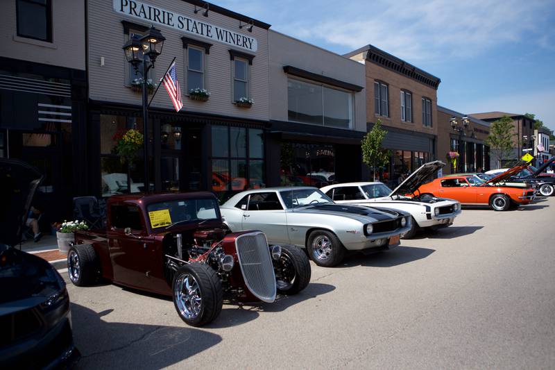 Cars fill the street as locals gather at the Crusin' to Genoa Car Show on Saturday, Aug.16,2025 in Genoa.