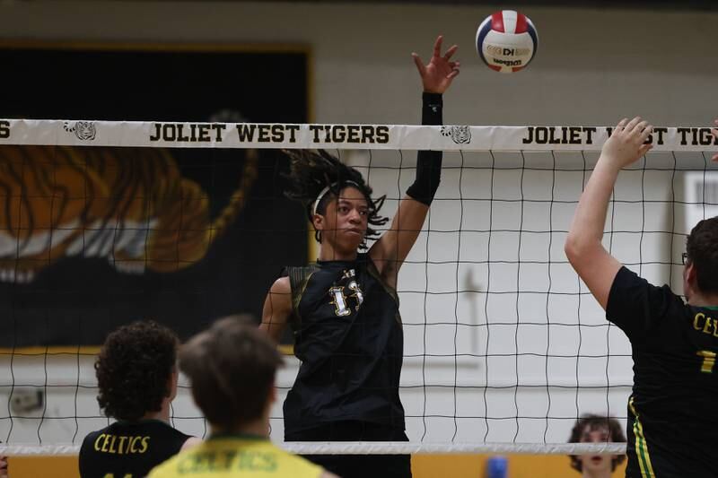 Joliet West’s Drew Johnson hits a shot against Providence on Thursday, March 23, 2023 in Joliet.