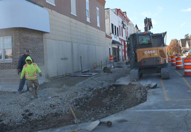 Crews remove chunks of a sidewalk at the corner of Jefferson and Main Street on Monday, Oct. 27, 2025 in Mendota. The City of Mendota is reconstructing sidewalks to comply with ADA accessibility. The project includes 2,100 square feet of sidewalk, 184 feet of curb and gutter, asphalt patching and other miscellaneous improvements.