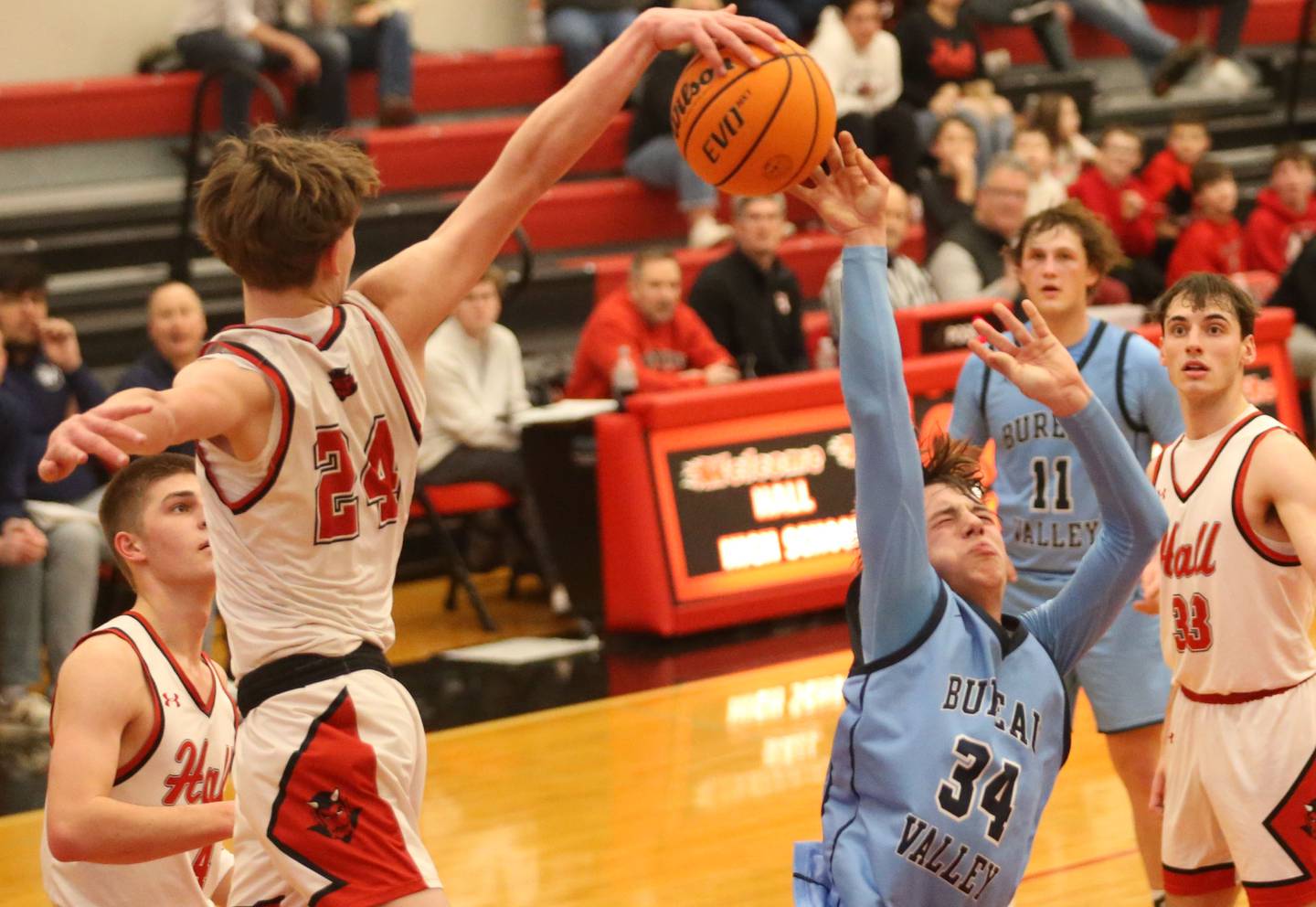 Hall's Gage Olson blocks Bureau Valley's Carson Gruber's shot on Wednesday, Jan. 28, 2026 at Hall High School.