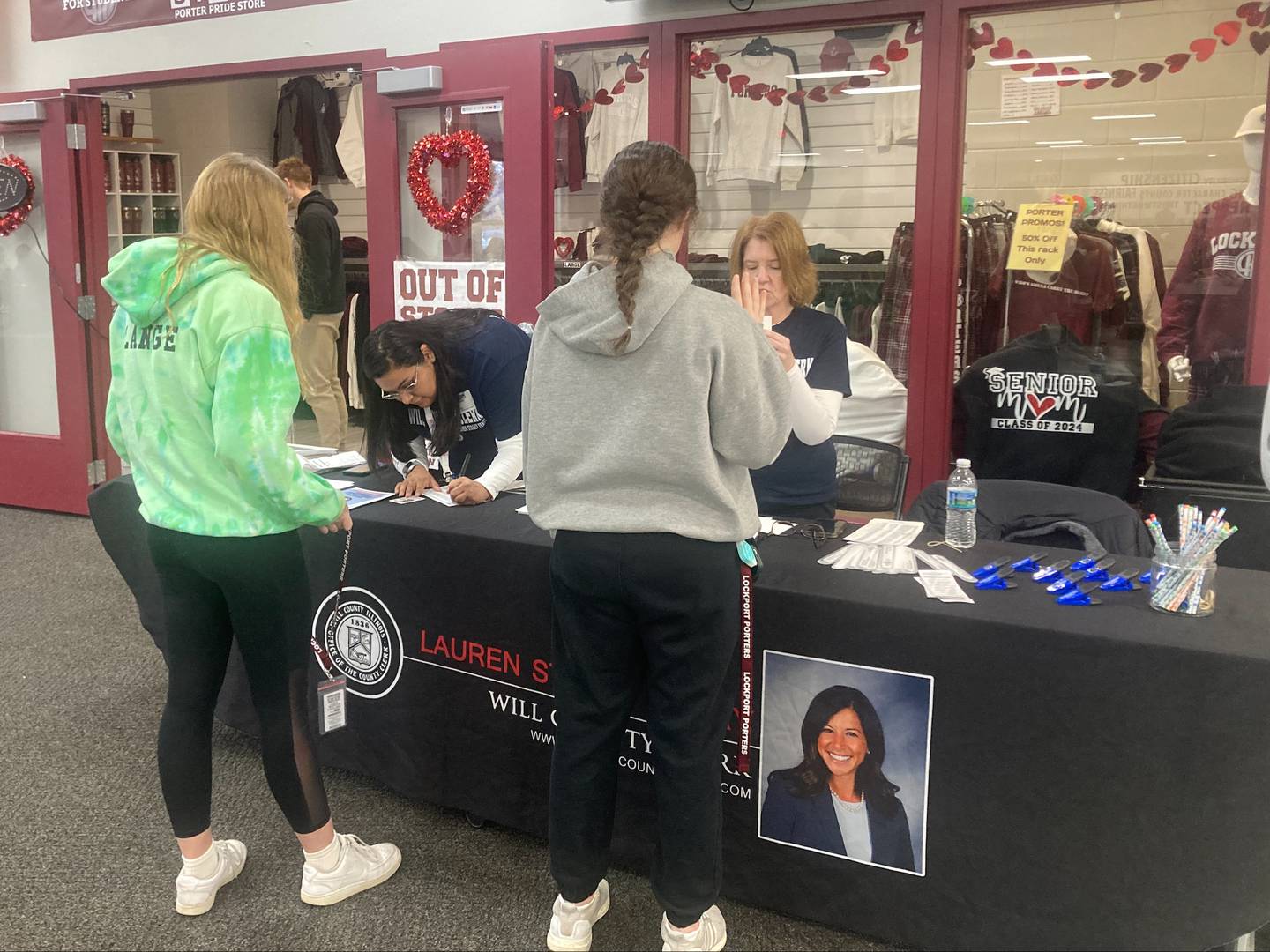 Representatives of the Will County Clerk's Office help Lockport Township High School students registers to vote during a voter registration event held at the East Campus on Tuesday, Jan. 30.  Students eligible to register were able to sign up during their lunch periods.