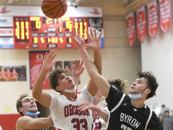 Area roundup: Dixon wrestlers claim conference crown; Rock Falls boys basketball notches first league win