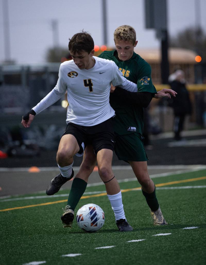 Herscher's Owen Bollino, front, is pressured by Coal City's Luke Munsterman during a sectional game on Tuesday, October 28, 2025.