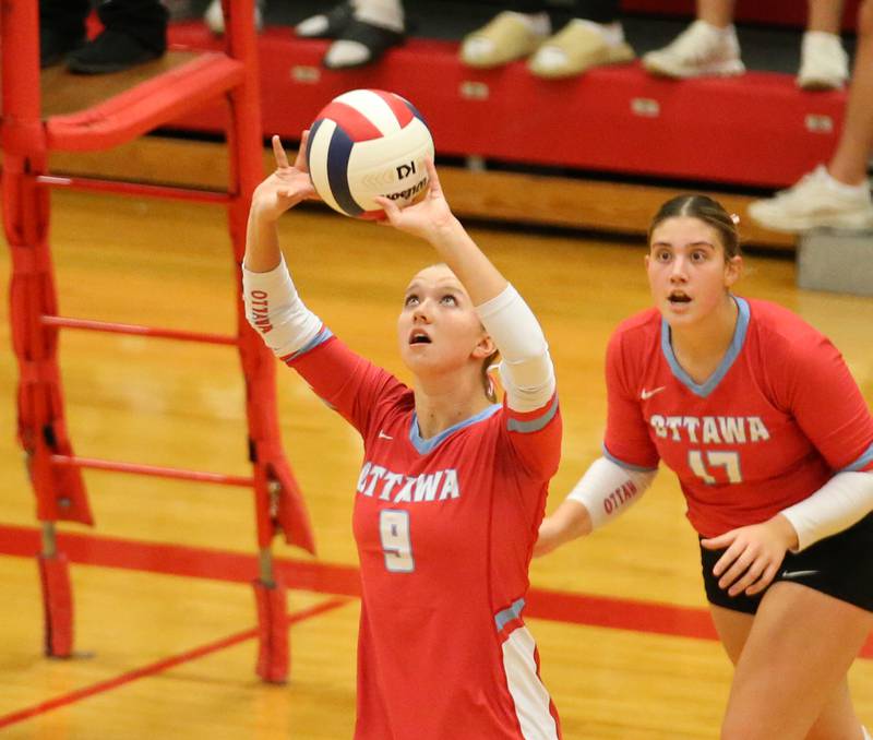 Ottawa's Skylar Dorsey sets the ball in the air for teammate Olivia Evola behind her on Tuesday, Oct. 17, 2023 at Sellett Gymnasium.