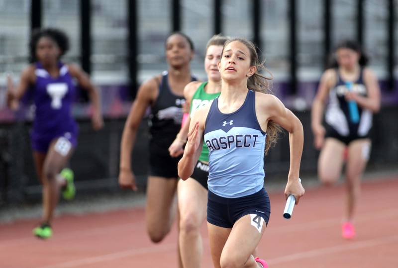 Prospect’s Nikki Niebrugge runs the anchor leg of the 4x100-meter relay during the Ritter Invite girls track and field meet at Downers Grove North on Friday, April 14, 2023.