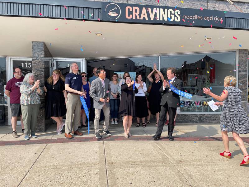 The Geneva Chamber of Commerce held a Ribbon Cutting on May 10 for Cravings at its 113 W. State St. location.
Geneva Mayor Kevin Burns and Chamber Board Member Neil Johnson of SVN Landmark Real Estate, LLC held the ribbon, while Cravings owners Sandy Siri and Max Wong cut the ribbon and celebrated with a confetti cannon.