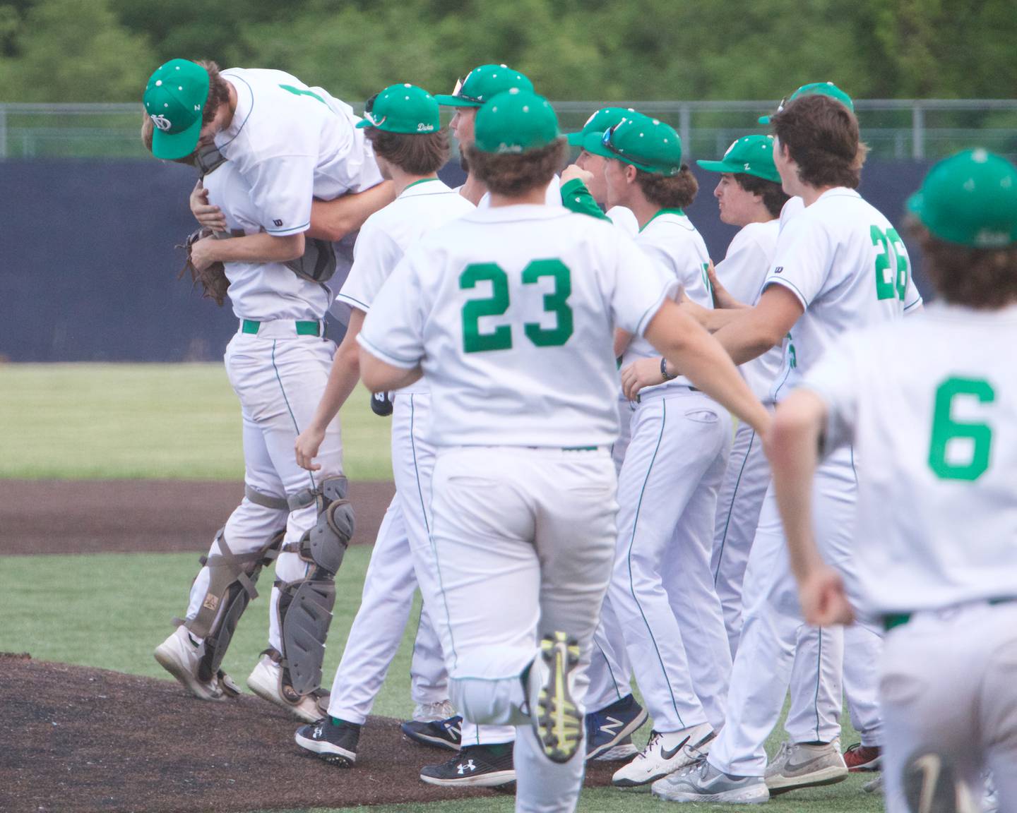 York celebrates the Win over St. Charles East 
at the Class 4A Sectional Semi Final on Wednesday, May 31, 2023 in Elgin.