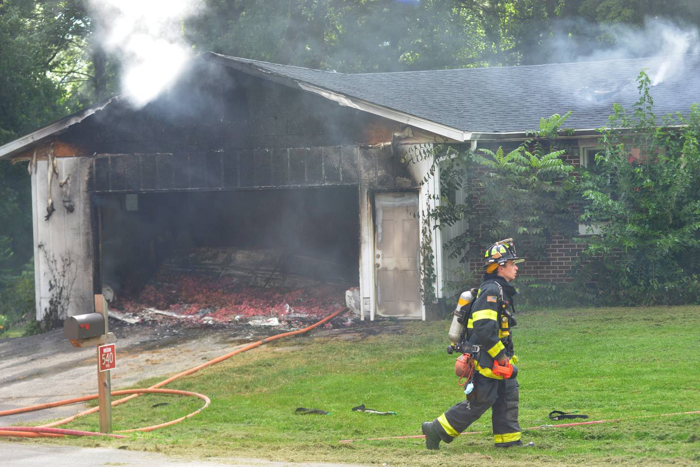 Firefighters from five departments responded to a garage fire at 540 E. Elizabeth Road, southeast of Oregon, on Wednesday, Aug. 20, 2025.