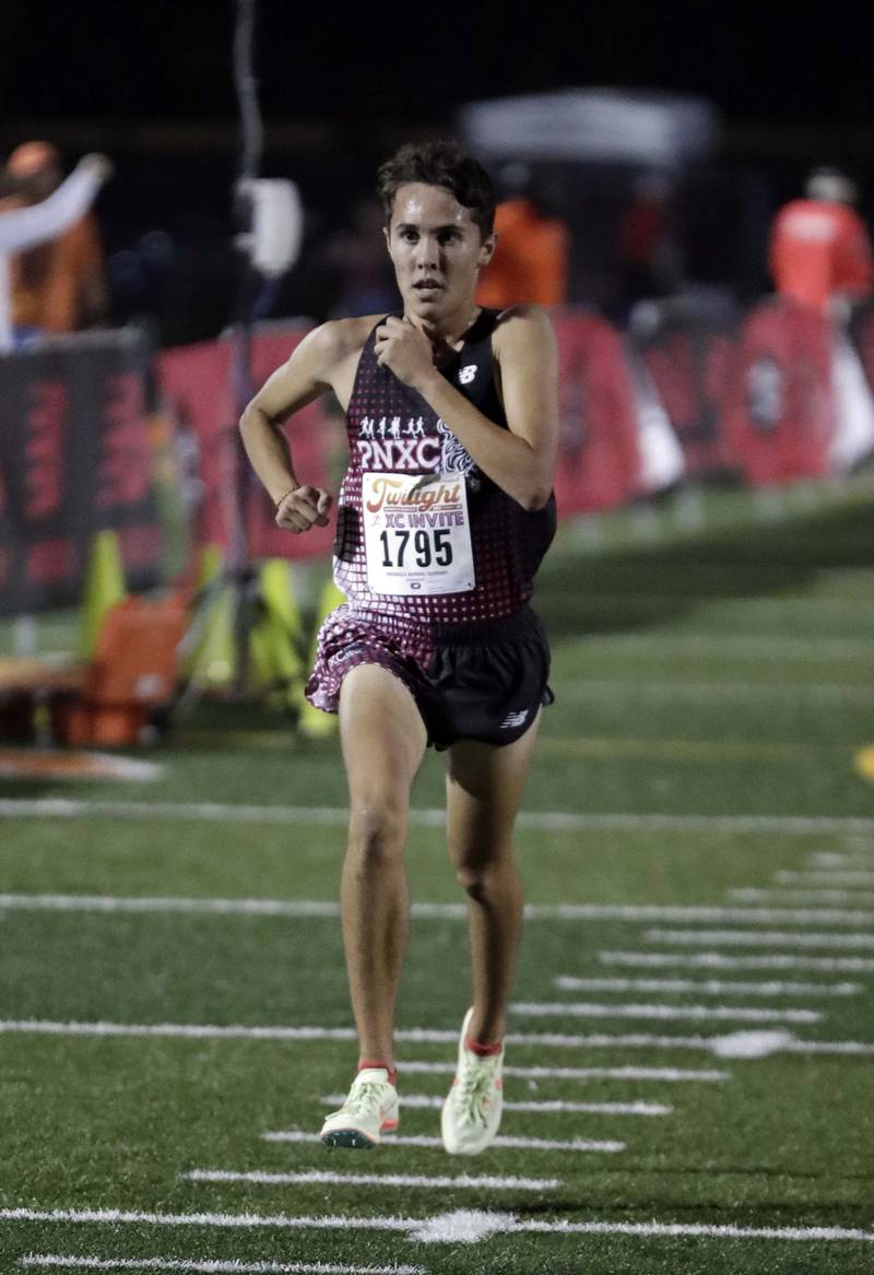 Photos Naperville North's Twilight Invitational cross country meet