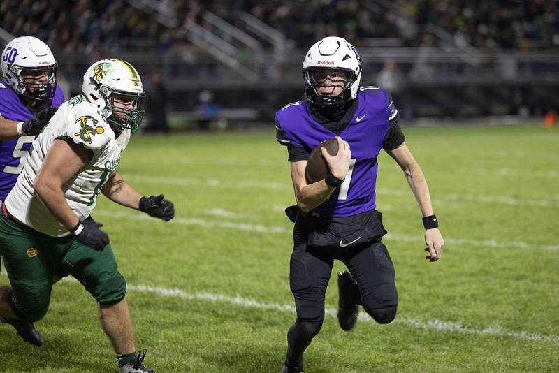 Dixon’s Jagger Kemp looks to the end zone against Coal City Friday, Nov. 7, 2025.