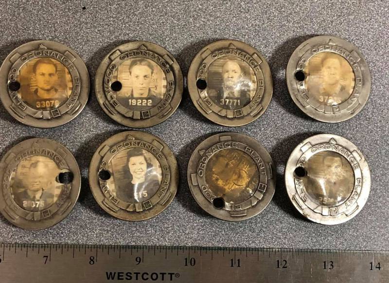 Pictured are employee badges from workers at the fomer Joliet Ammunition Plant. These were donated to Midewin National Tallgrass Prairie by the family of the World War II era security officer. The badges would have been recovered when the employee left their job or, most likely, if the photo in the badge was no longer clearly discernable. They are sealed so the photos couldn’t be easily swapped out.