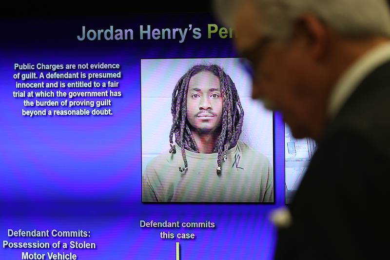 Will County State’s Attorney James Glasgow holds a press conference on Wednesday for the announcement of Jordan Henry’s 22-year prison sentence after Henry was convicted of aggravated vehicular hijacking, armed robbery, fleeing and other offenses.