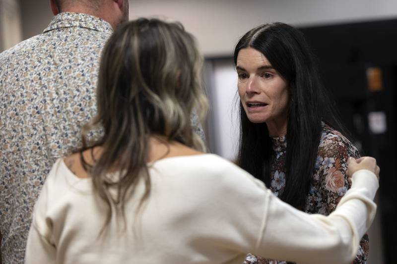 Brittany Ramos speaks with supporters Friday, Nov. 14, 2025, after a jury awarded her $31.5 million dollars for the wrongful death of husband firefighter Garrett Ramos.