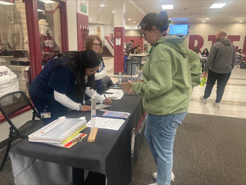 Lockport Township High School Senior Mia Angelo registers to vote during a voter registration event held at the East Campus on Tuesday, Jan. 30.  Representatives from the Will County Clerk’s Office were present for students to sign up during their lunch periods.