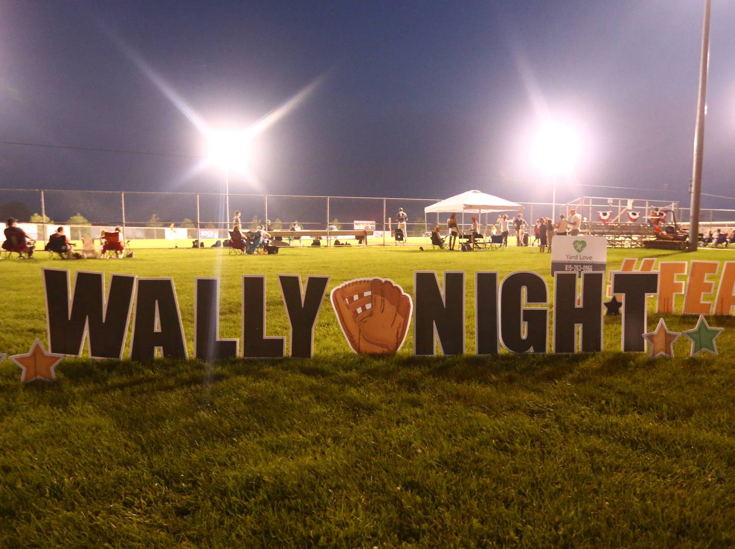 A sign showing "Wally Night" at the Illinois Valley Pistol Shrimp game decorated Veteran's Park in Peru on Saturday. The team honored the nationally known wallaroo who escaped in Peru last December. The team changed its name to the Peru Wallaroos in his honor for that one game.