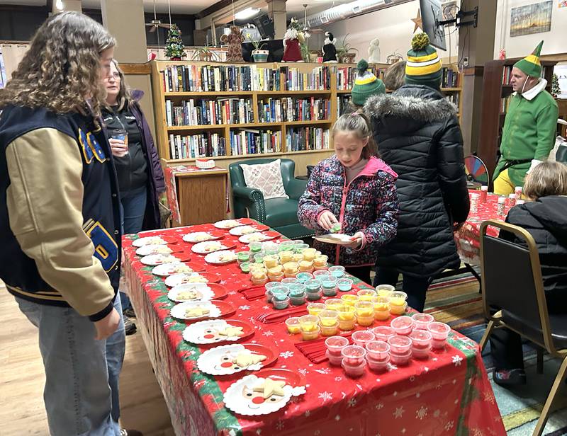 Polo High School students helped kids decorate Christmas cookies at the Polo Senior Center during the Polo Christmas Festival on Saturday, Dec. 6, 2025.