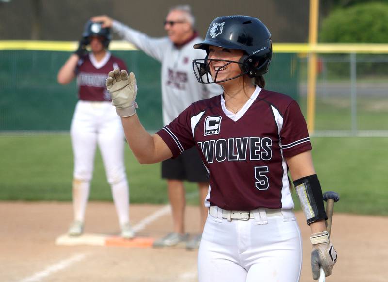 Prairie Ridge’s Mary Myers is all smiles as the Wolves score against Crystal Lake Central in Class 3A Regional softball action at Crystal Lake South Wednesday. The Wolves won 1-0.
