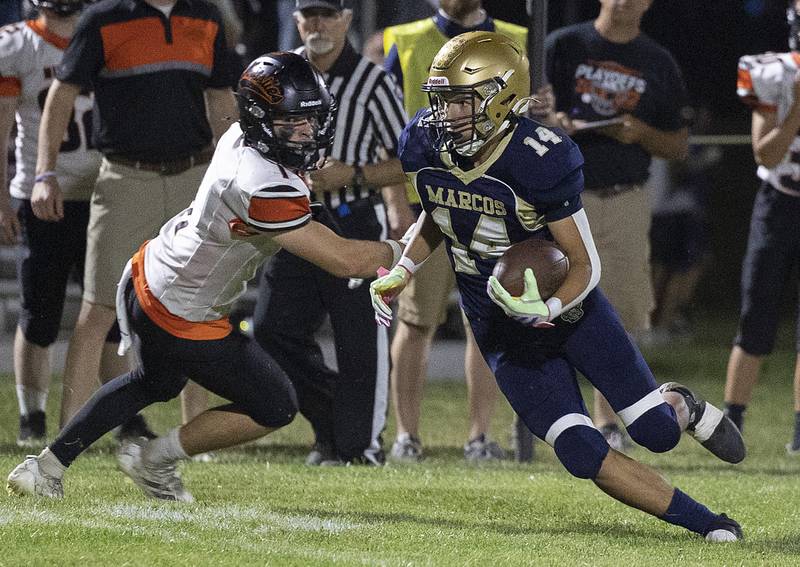 Polo’s Jordan Reed makes a move against Milledgeville’s Evan Schenck Friday, Sept. 19, 2025.