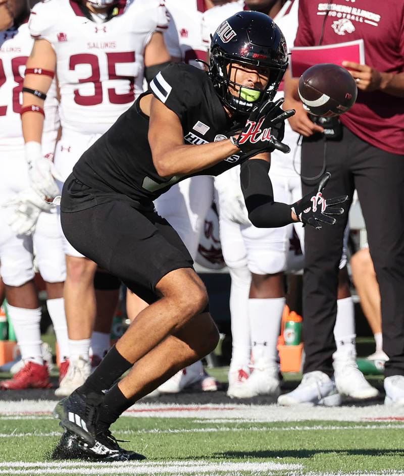 Northern Illinois' Davis Patterson makes a catch in front of the Southern Illinois bench during their game Saturday, Sept. 9, 2023, in Huskie Stadium at NIU in DeKalb.