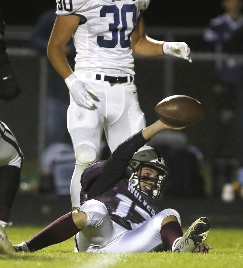 Prairie Ridge's Logan Harlow holds up the football after intercepting a Cary-Grove's Payton Seaburg pass during a Fox Valley Conference football game between Prairie Ridge  and Cary-Grove Friday, Sept. 23, 2022, at Prairie Ridge High School in Crystal Lake.