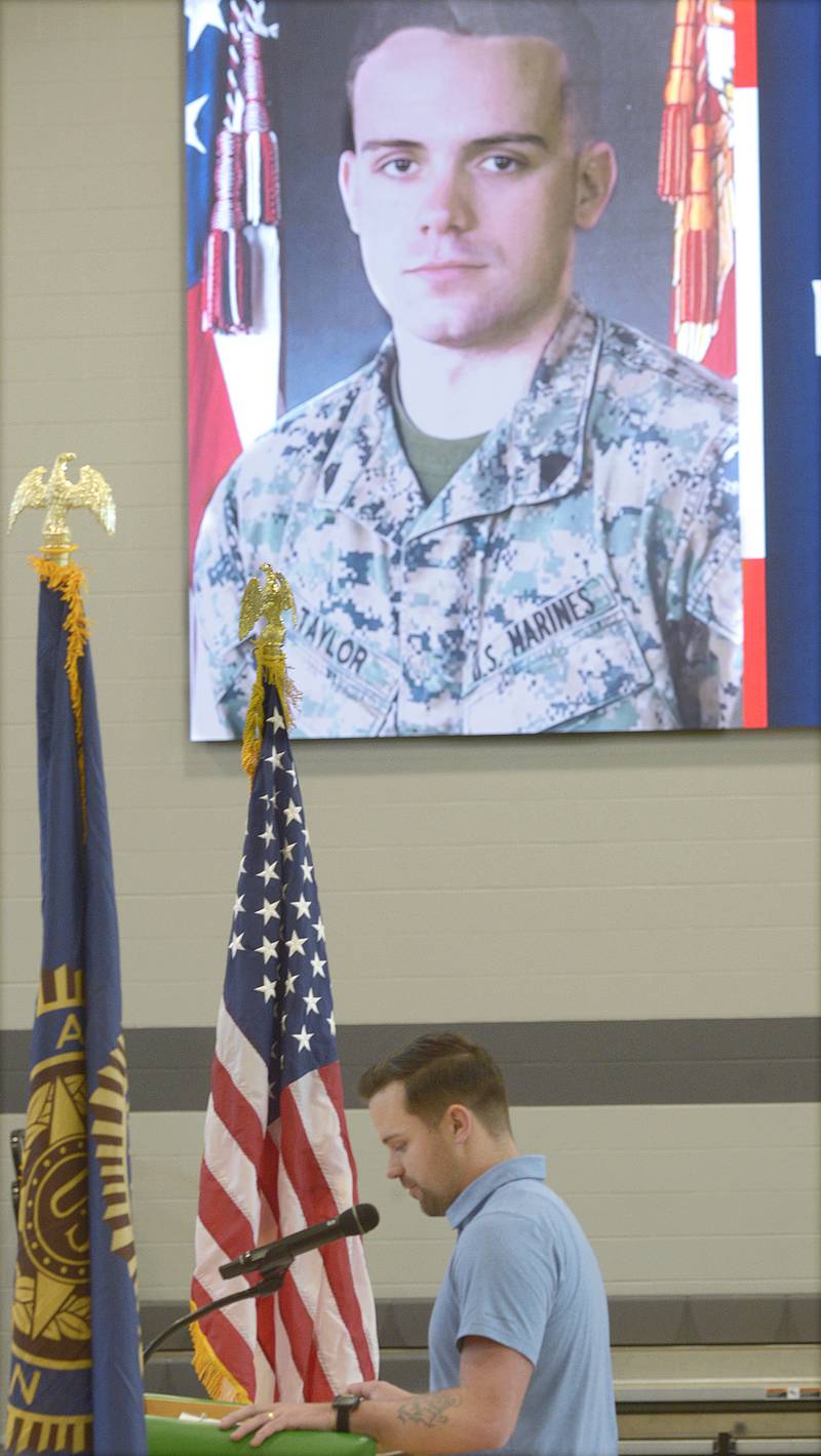Former Seneca High School student and Marine, Michael Taylor was the featured speaker Monday at the Veterans Day ceremony at Seneca High School. The event was sponsored and led by The Seneca FFA.