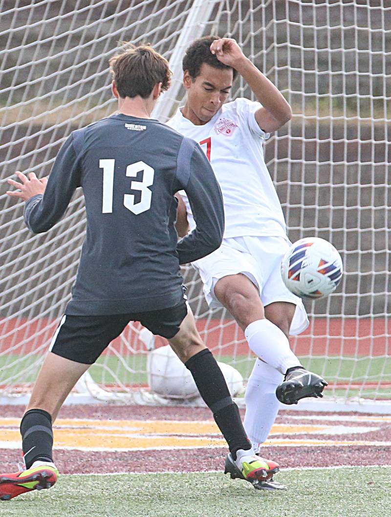Timothy Christian's Nathan Canada (7) clears the ball out of the box as Wheaton Academy's Alex Moncau (13) fails to score during the Class 1A State soccer third place game on Saturday, Oct. 29, 2022 at EastSide Centre in Peoria.