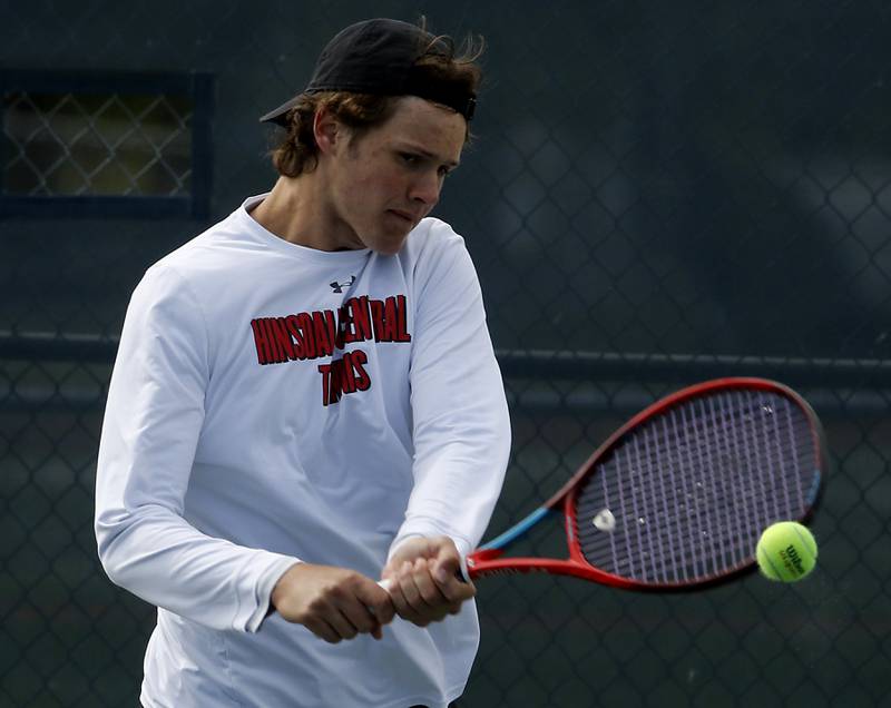Hinsdale Central's Aidan Hernandez returns the ball during an IHSA 2A boys doubles tennis match Thursday, May 25, 2023, at Buffalo Grove High School.
