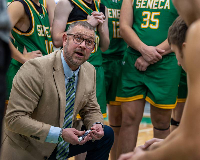 Seneca Head Coach, Nathaniel Meiss talks to team during timeout during game against Hall in the Shipyard Showdown on Tuesday, December 23, 2025 at Seneca High School in Seneca.