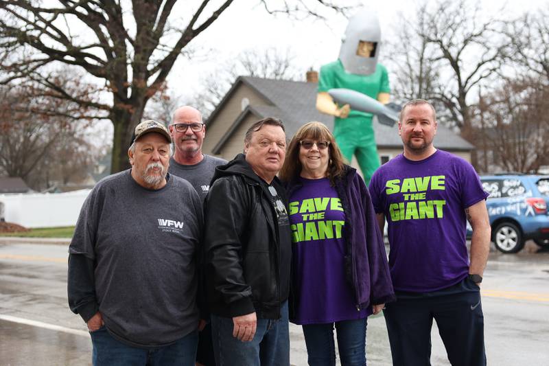 The VFW Post 5422 JR Miller, left to right, Jerry Mass, Wally Wink and his wife Marian, and Scott Durano (not pictured) has teamed up with Ryan Jandura to try and save the Launching Pad restaurant’s Gemini Giant in Wilmington.
