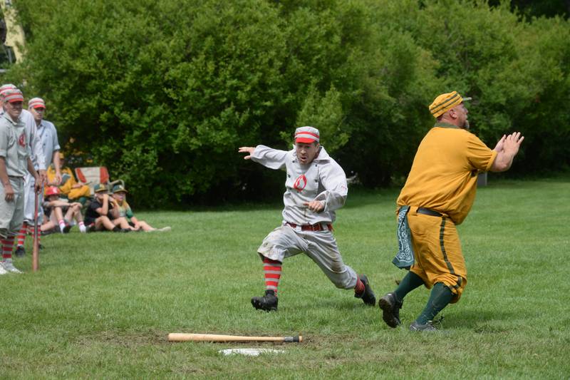 Ganymede's Eric Berg races to home plate for a run against Flat Rock on Saturday, Aug. 12, 2023 at the 20th Annual World Tournament of Historic Base Ball.