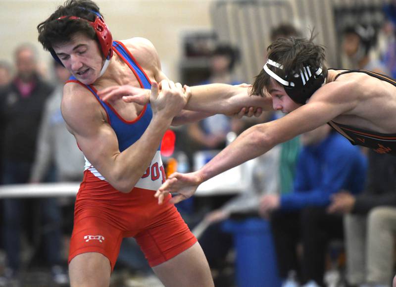 Oregon's Nelson Benesh (left) wrestles Freeport's Thomas Olson in the 138-pound championship match at the Polo Wrestling Invitational on Saturday, Jan, 10, 2026 at Polo High School.
