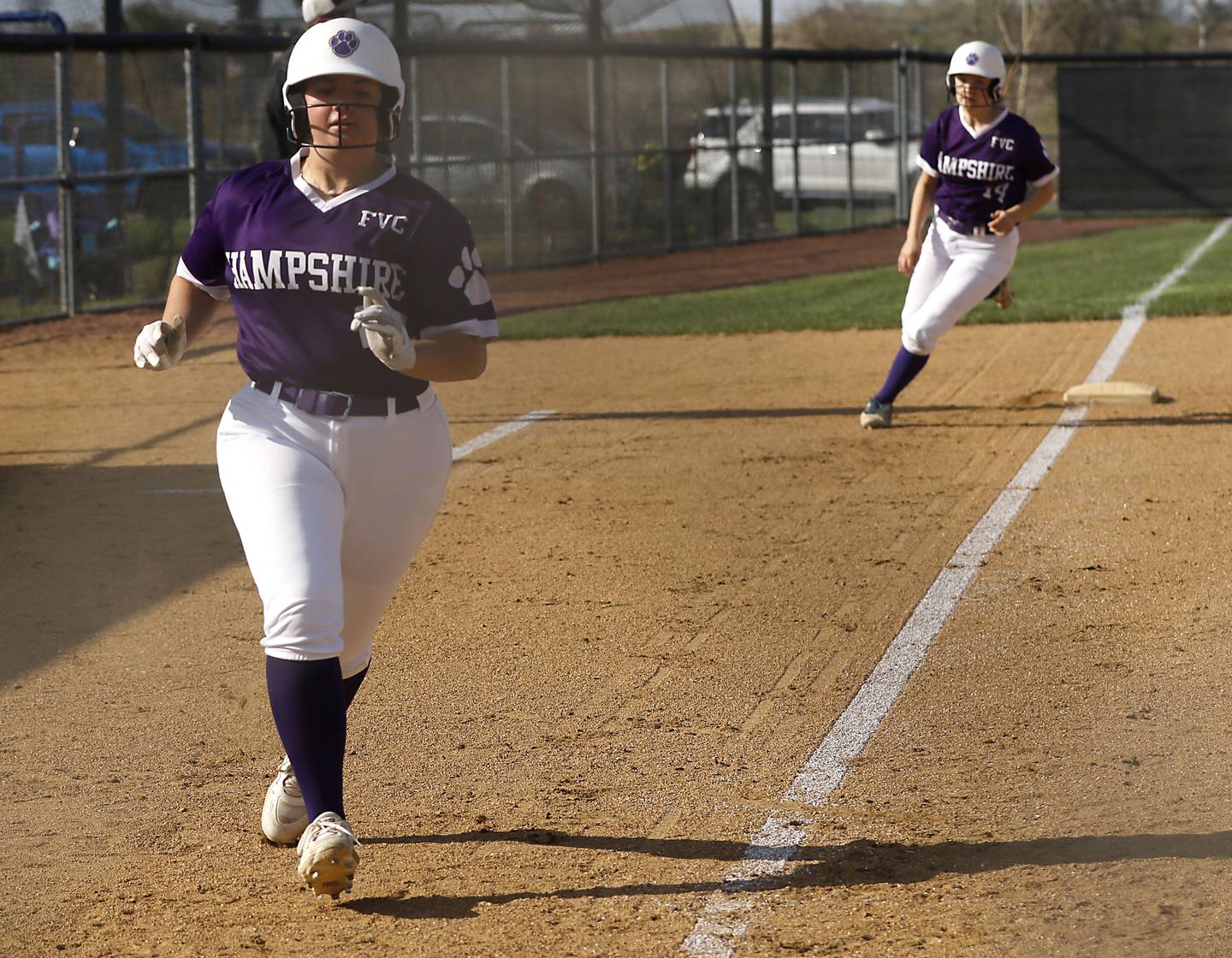 Hampshire's Dylenn Hultberg  runs home to score a run during a Fox Valley Conference softball game against Burlington Central on Tuesday, April 21, 2026, at Hampshire High School.