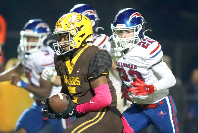 Jacobs’ Michael Cannady runs the ball against Dundee-Crown in varsity football  at Jacobs High School in Algonquin on Friday, Oct. 10, 2025.