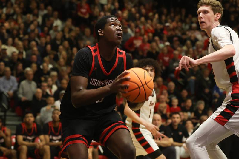 Bolingbrook’s Elijah Anderson works under the basket against Benet in the Class 4A Bolingbrook Sectional championship game on Friday, March 6, 2026 in Bolingbrook.