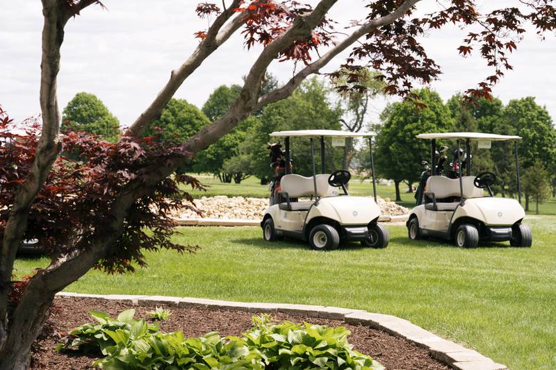 Carts are lined up at Emerald Hill Golf Course in Sterling.