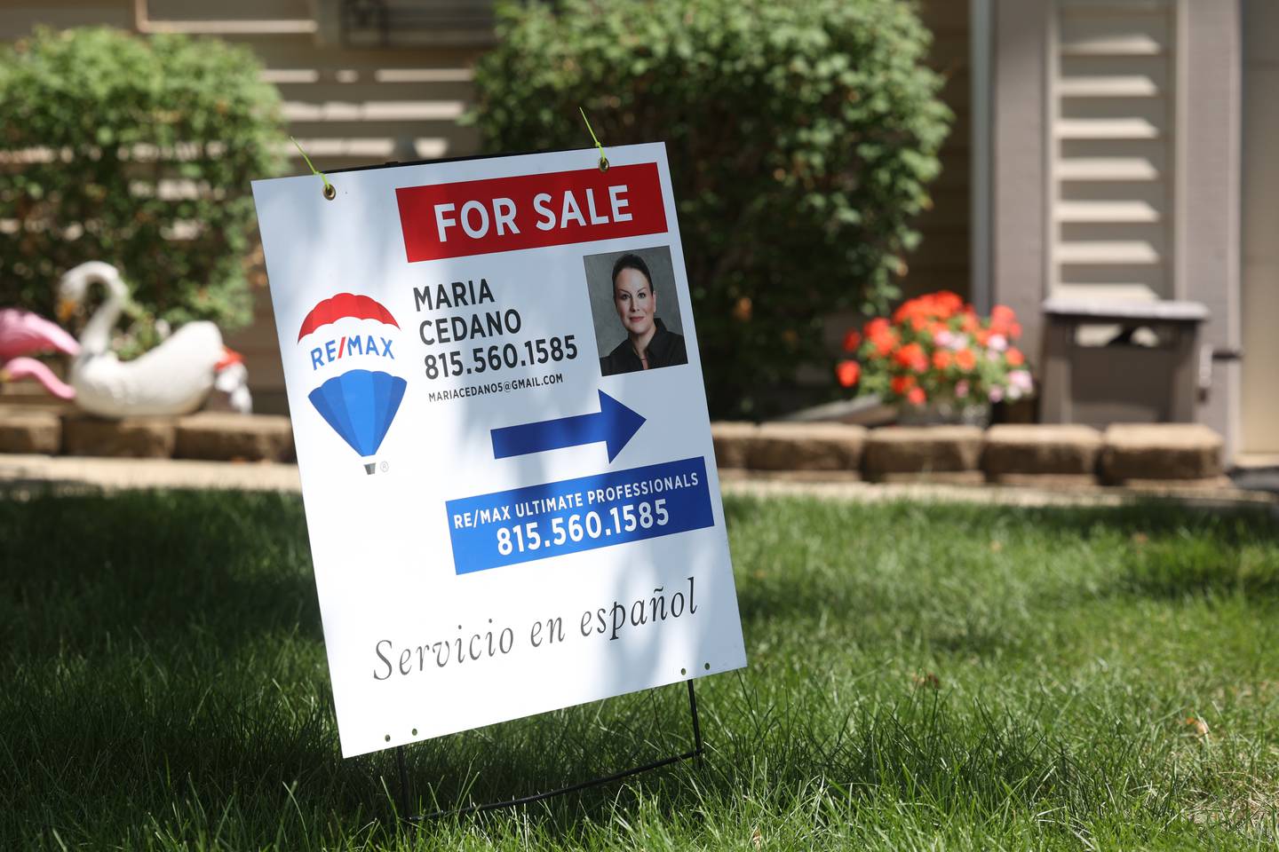 a For Sale sign by Maria Cedano, a realtor with ReMax, sits in the yard of a home in Crest Hill. Wednesday, Aug. 10, 2022, in Crest Hill.