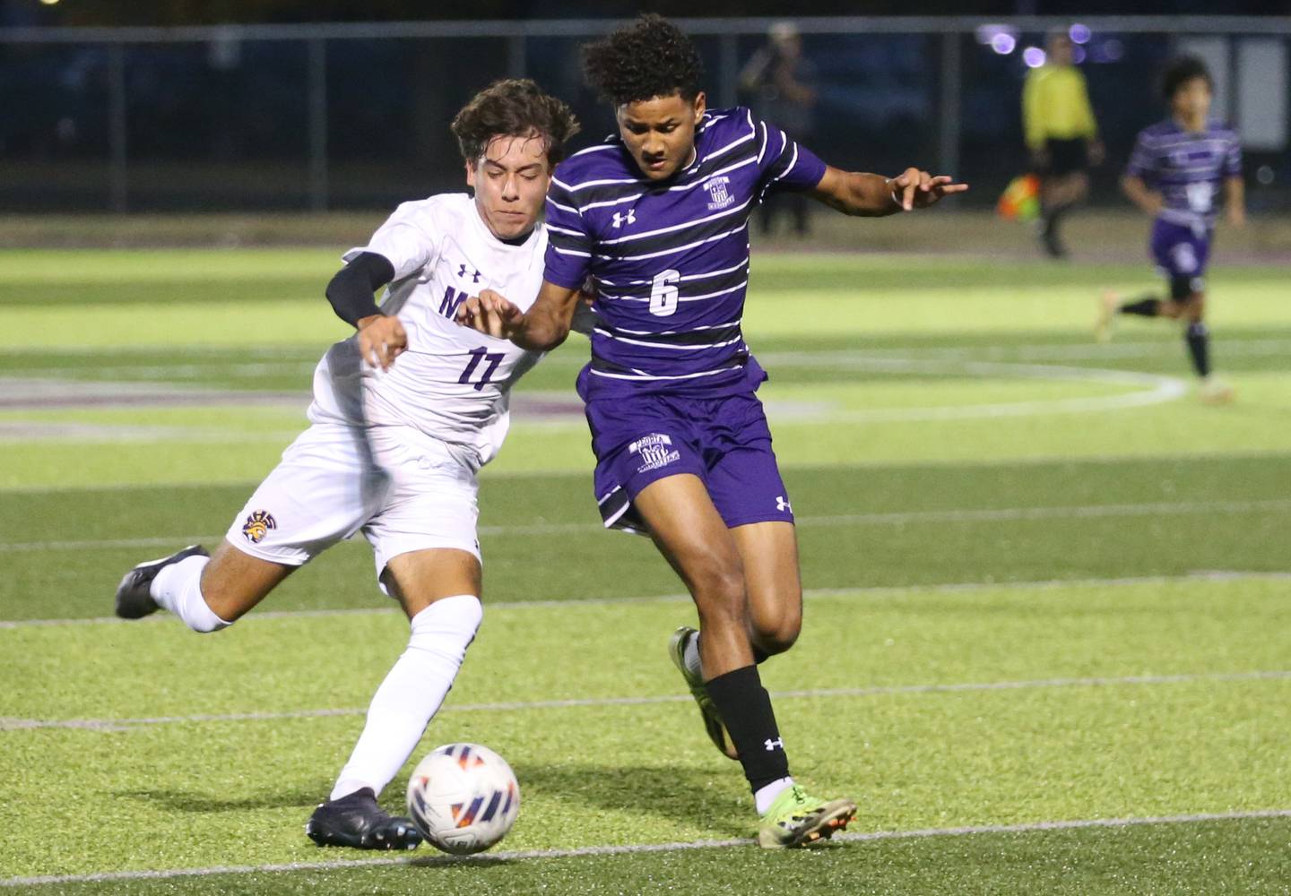 Mendota's Cesar Casas kicks the ball away from Peoria Christian's Trae Brickner during the Class 1A Sectional game on Wednesday, Oct. 30, 2024 at Chillicothe High School.