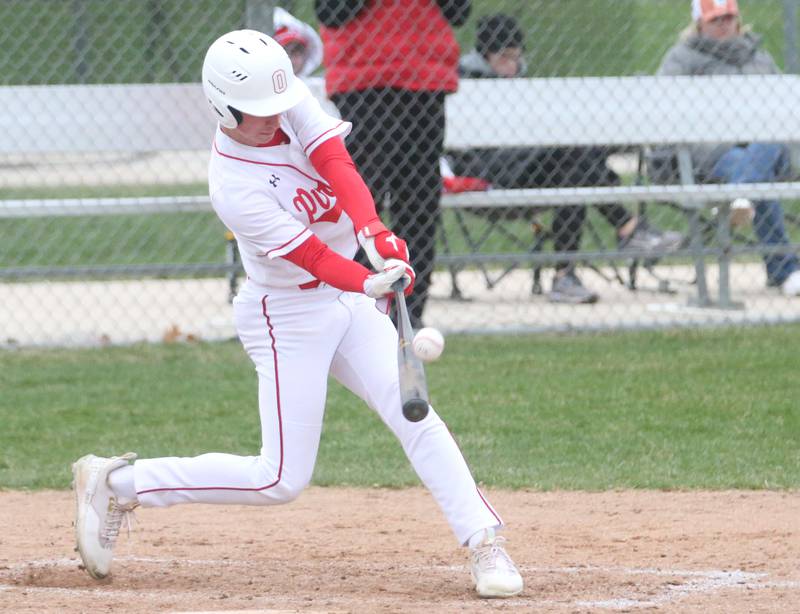 Ottawa's Lucas Farabaugh makes contact with the ball while playing Hall on Tuesday, April 1, 2025 at Ottawa High School.