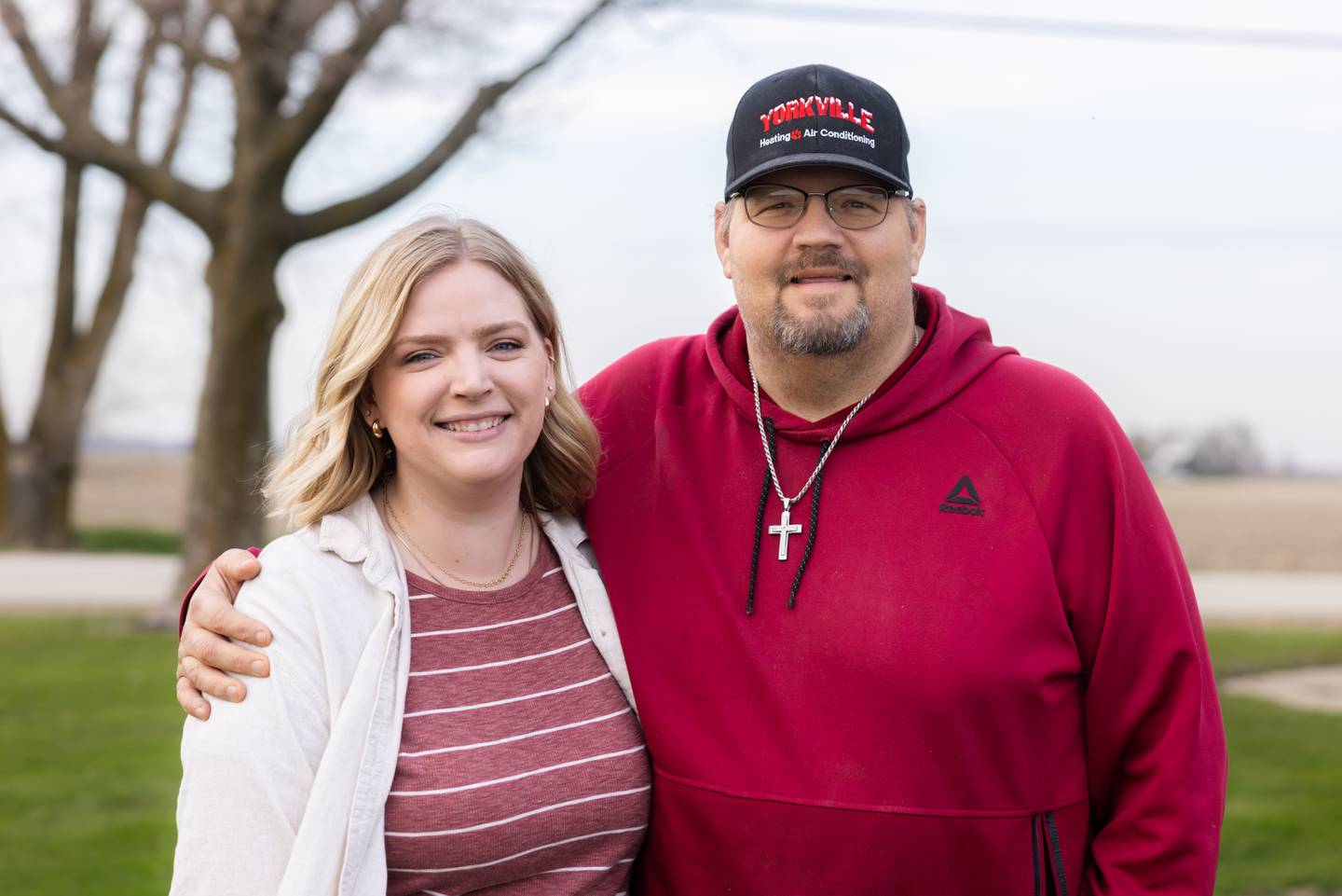 Kelsey Krumme, center, an elementary school librarian at Emerson Elementary in Wheaton, will donate a kidney to Joe Howard, right.