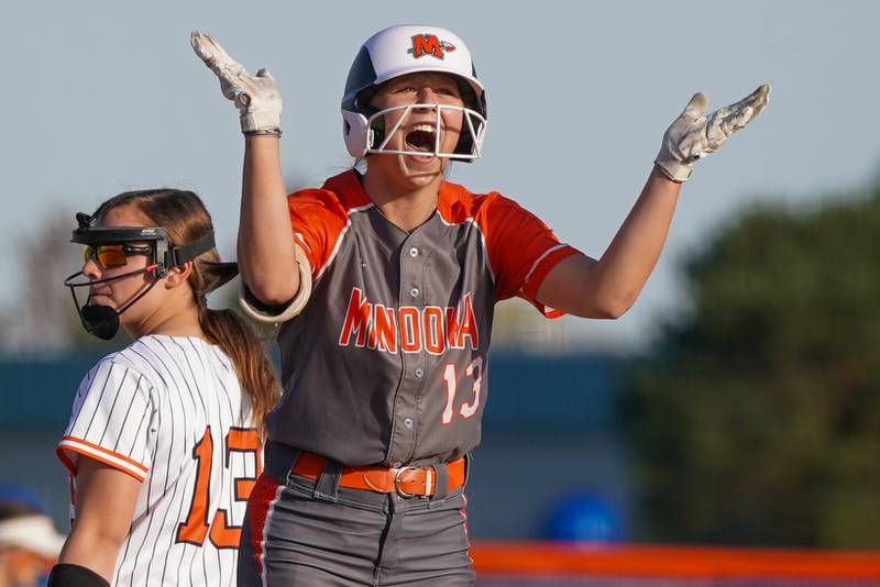 Minooka’s Gracie Anderson (13) reacts after hitting a two run double during a Southwest Prairie Conference softball game against Oswego at Oswego High School on Wednesday, April 23, 2025.