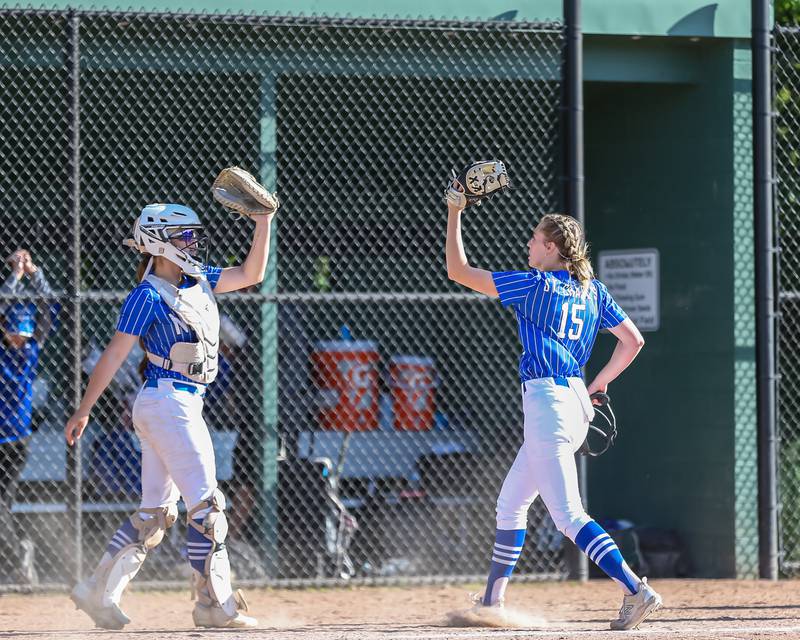 St Charles North's Paige Murray (15) leaves the field after pitching a strong inning during the Class 4A Glenbard West Regional Final softball game between Glenbard North at St Charles North.  May 26, 2023.