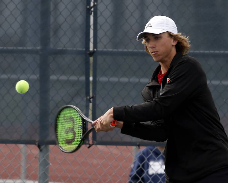Huntley’s Ben Hein returns the ball during an IHSA 2A boys doubles tennis match Thursday, May 25, 2023, at Buffalo Grove High School.