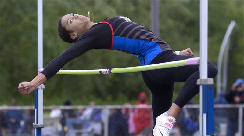 Newark’s Kiara Wesseh clears the bar during high jump competition at the girls sectional Thursday at Seneca’s