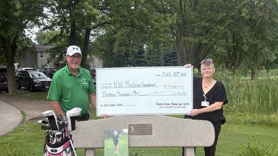 DeKalb man donates thousands to cancer center in late wife’s memory