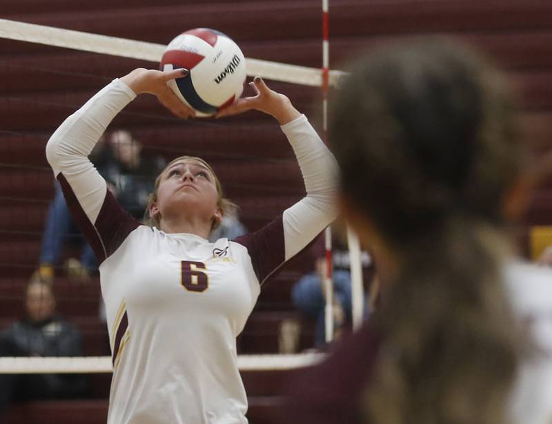 Richmond-Burton's Josie Franckowiak sets the ball during a Kishwaukee River Conference volleyball match against Woodstock North on Wednesday, Oct. 15, 2025, at the Richmond-Burton High School in Richmond.