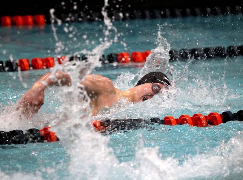Woodstock North co-op's Quinn Cynor swims the 200-yard freestyle during the IHSA Boys Swimming and Diving Championships on Feb. 29 at Evanston High School.